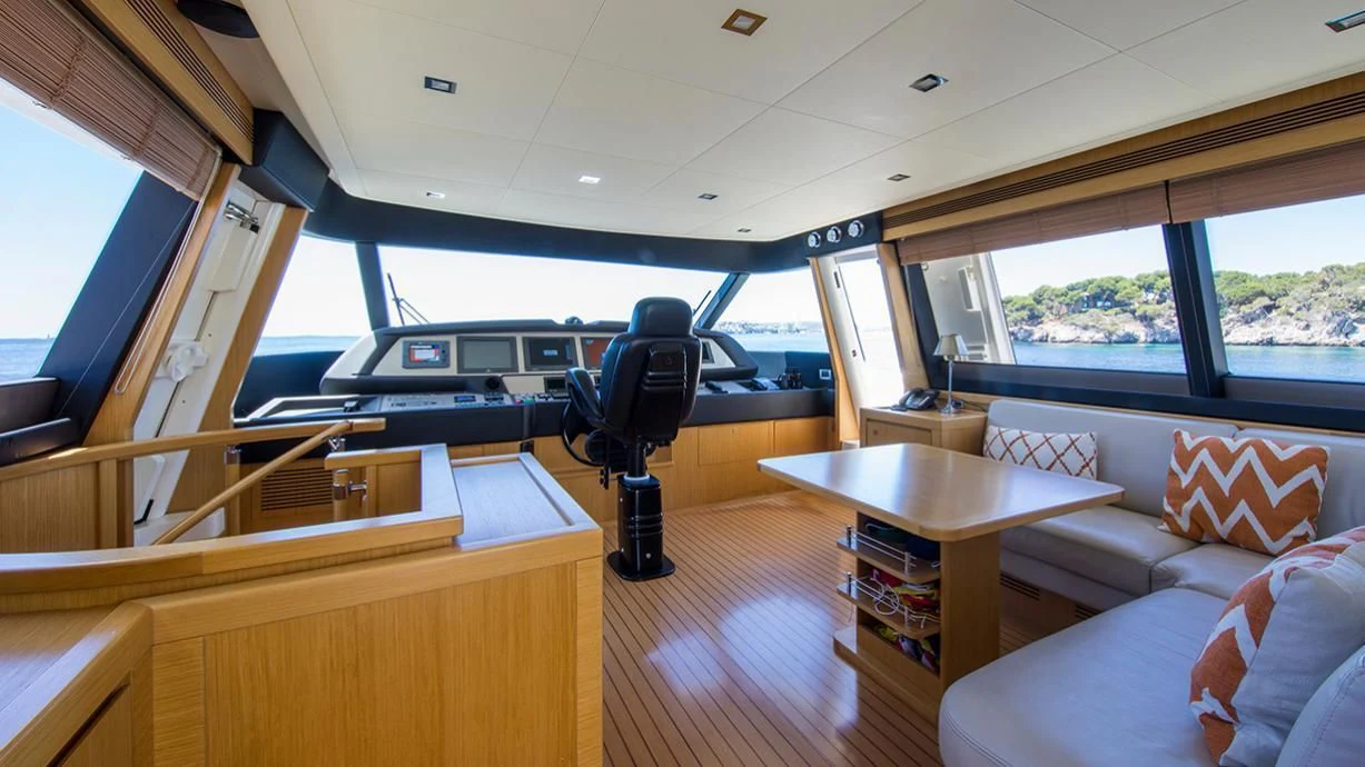 a room with a desk and a chair aboard EOLIA Yacht for Sale