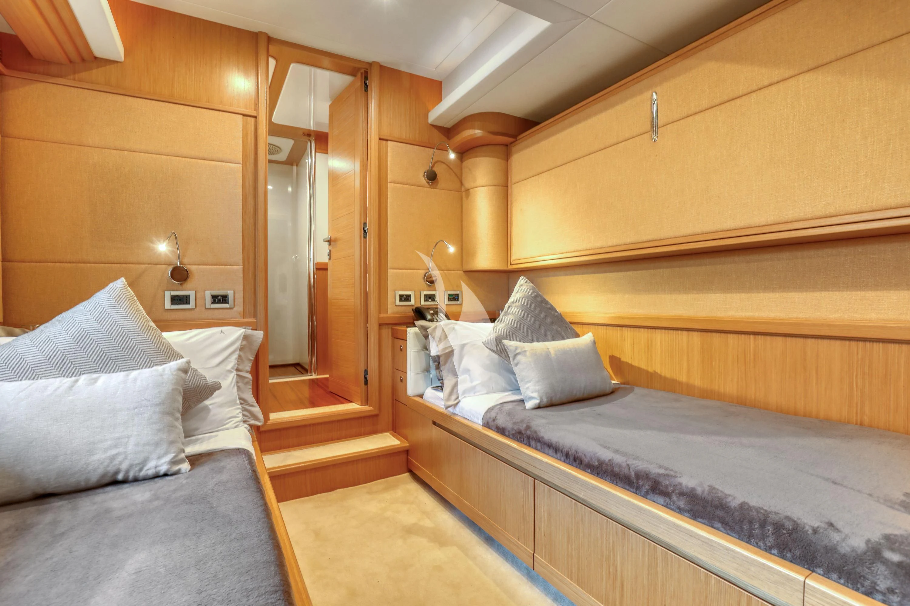 a room with a bed and a mirror aboard EOLIA Yacht for Sale