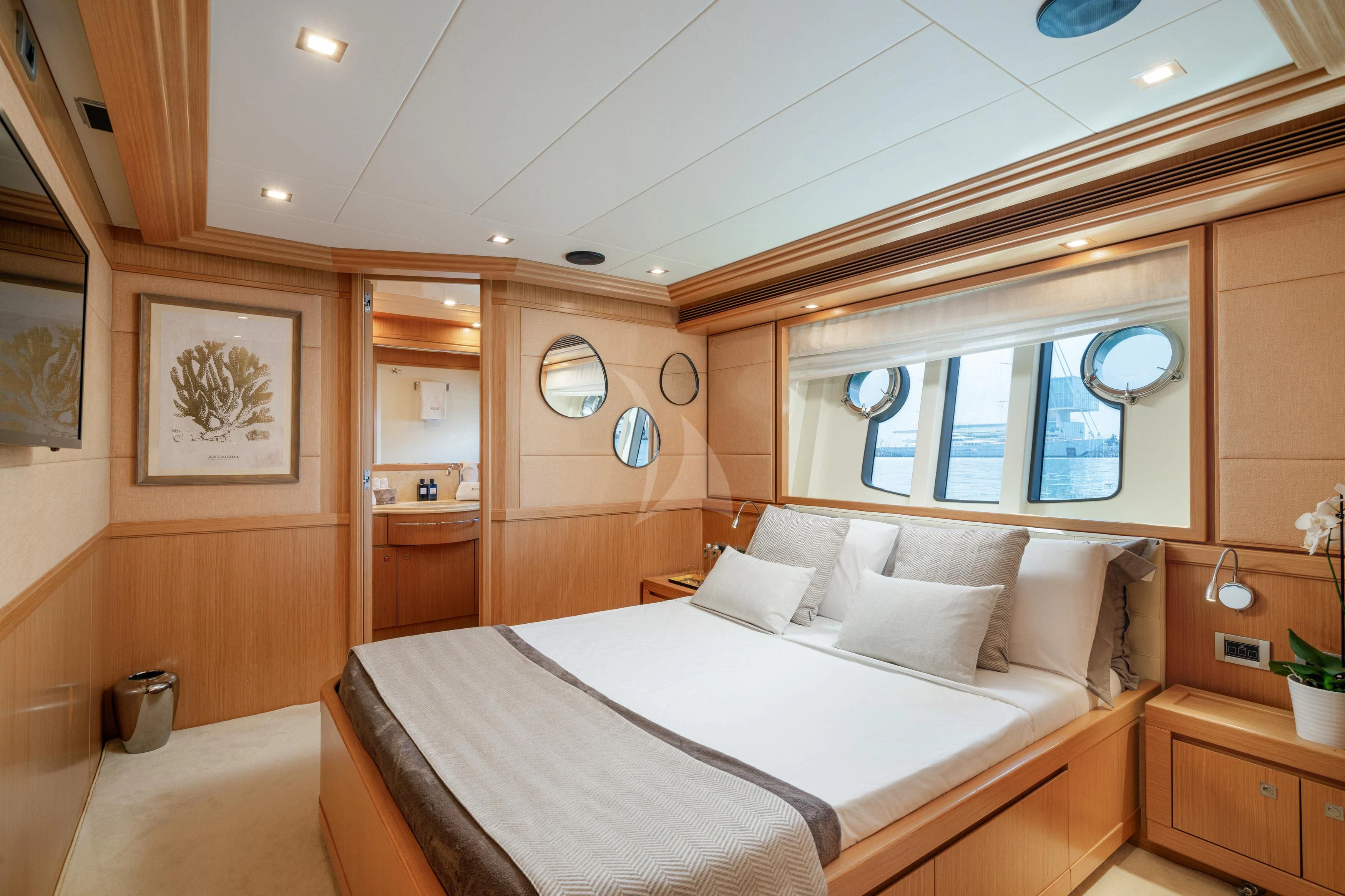 a large hotel room with a large bed aboard EOLIA Yacht for Sale