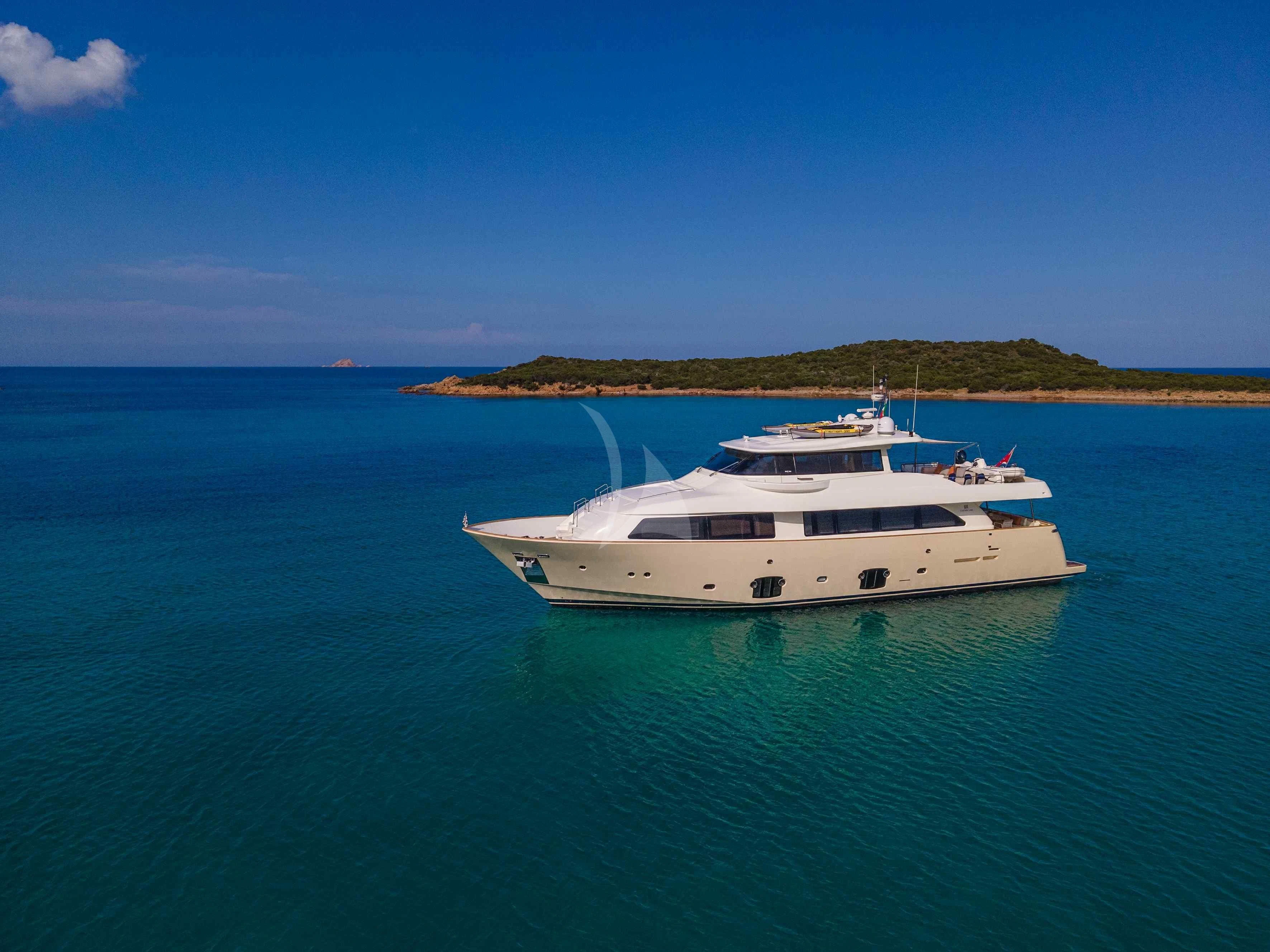 a white boat in the water aboard EOLIA Yacht for Sale