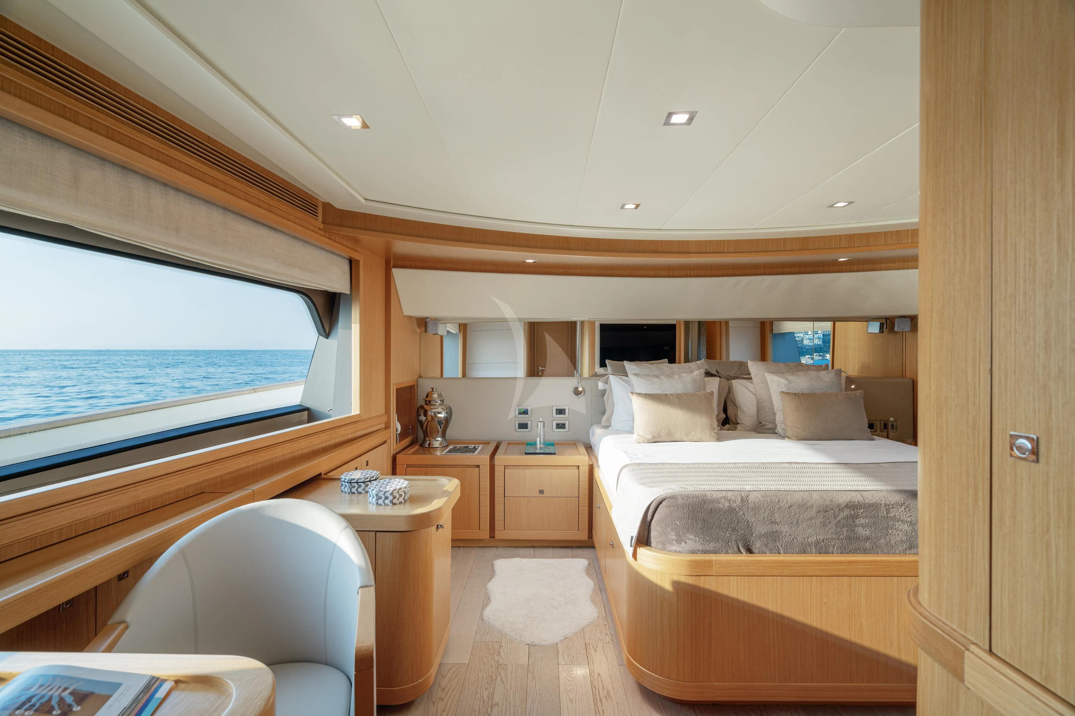 a room with a bed and a window aboard EOLIA Yacht for Sale