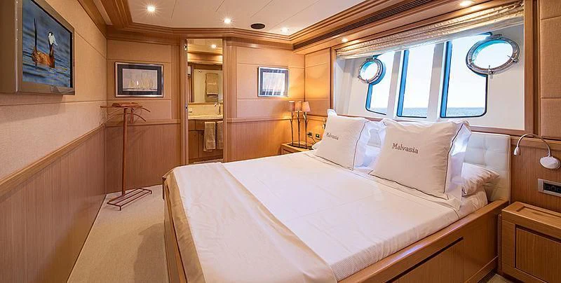 a bed in a room aboard EOLIA Yacht for Sale