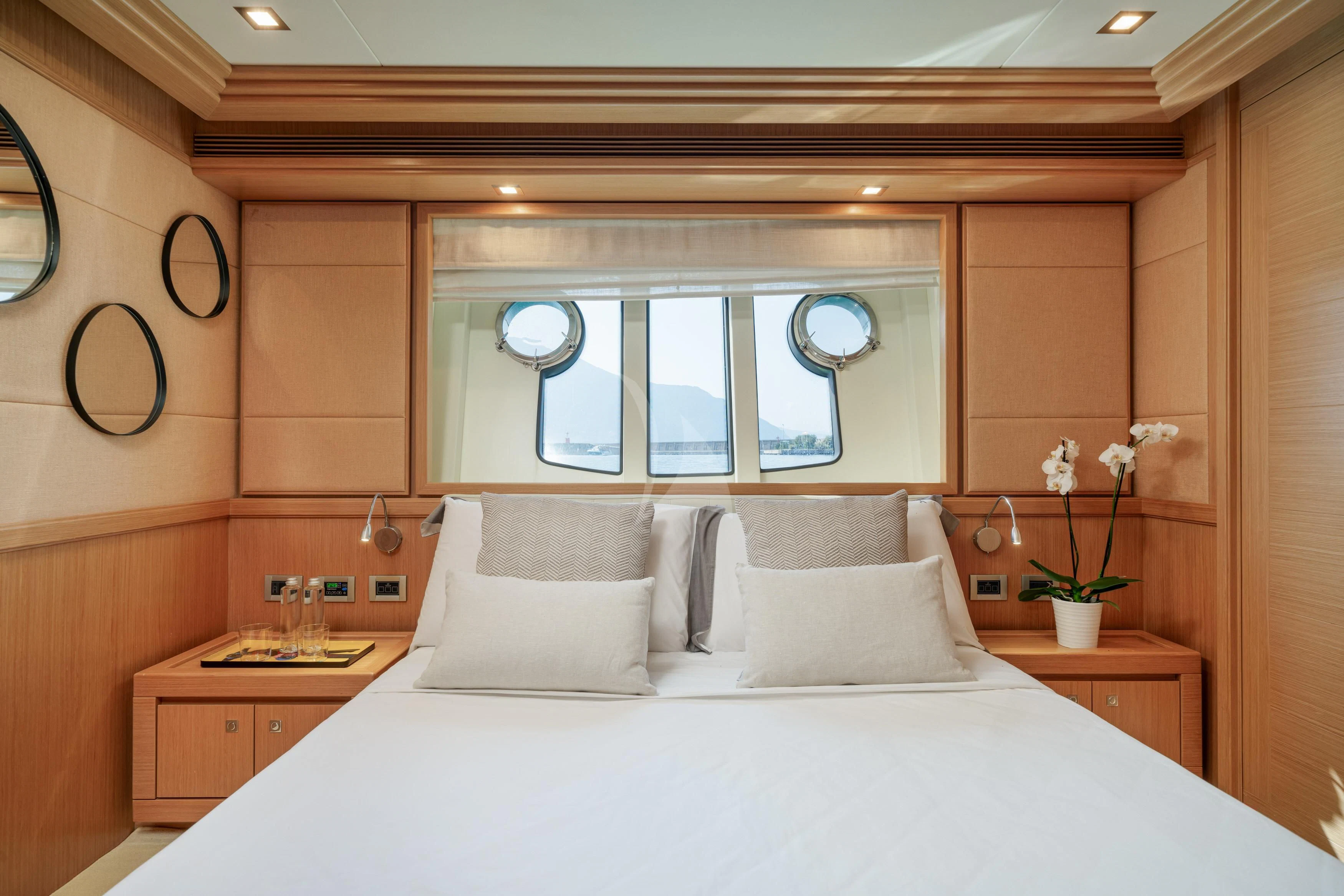 a bed with white sheets aboard EOLIA Yacht for Sale