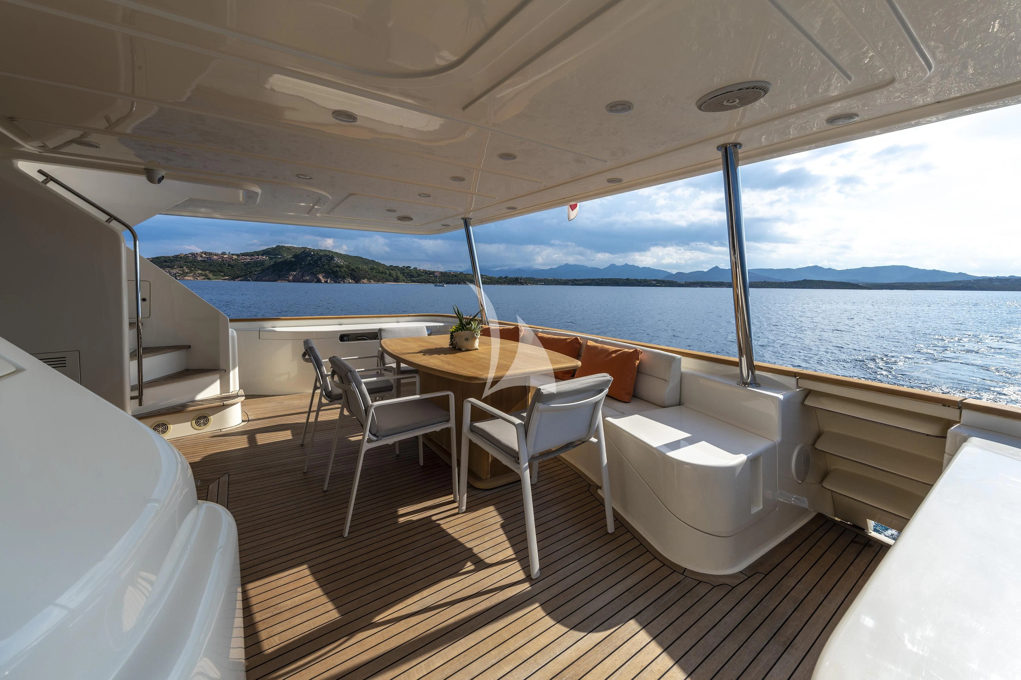 a boat with a table and chairs aboard EOLIA Yacht for Sale