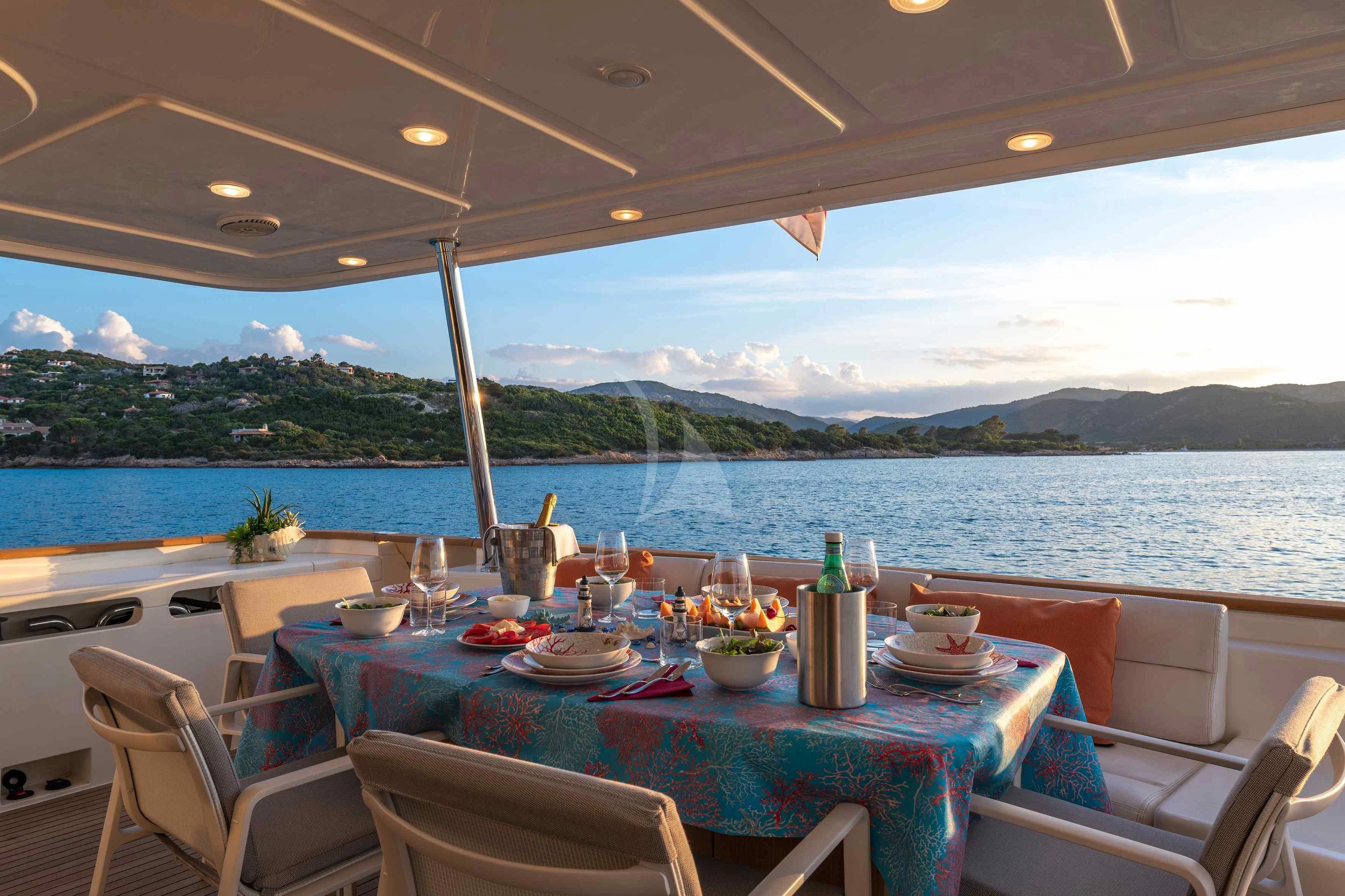 a table with food on it aboard EOLIA Yacht for Sale