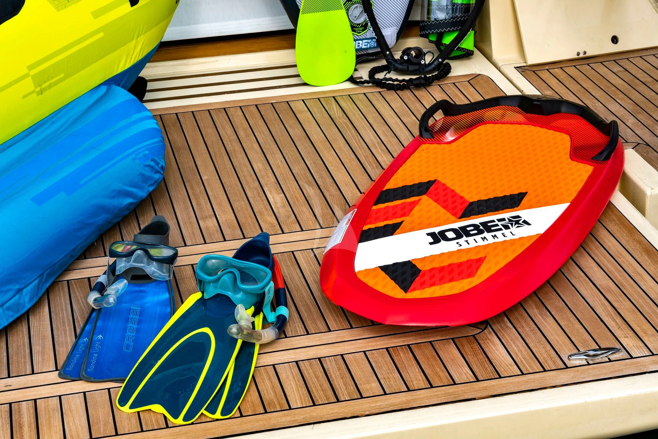 a red and blue helmet on a table aboard EOLIA Yacht for Sale