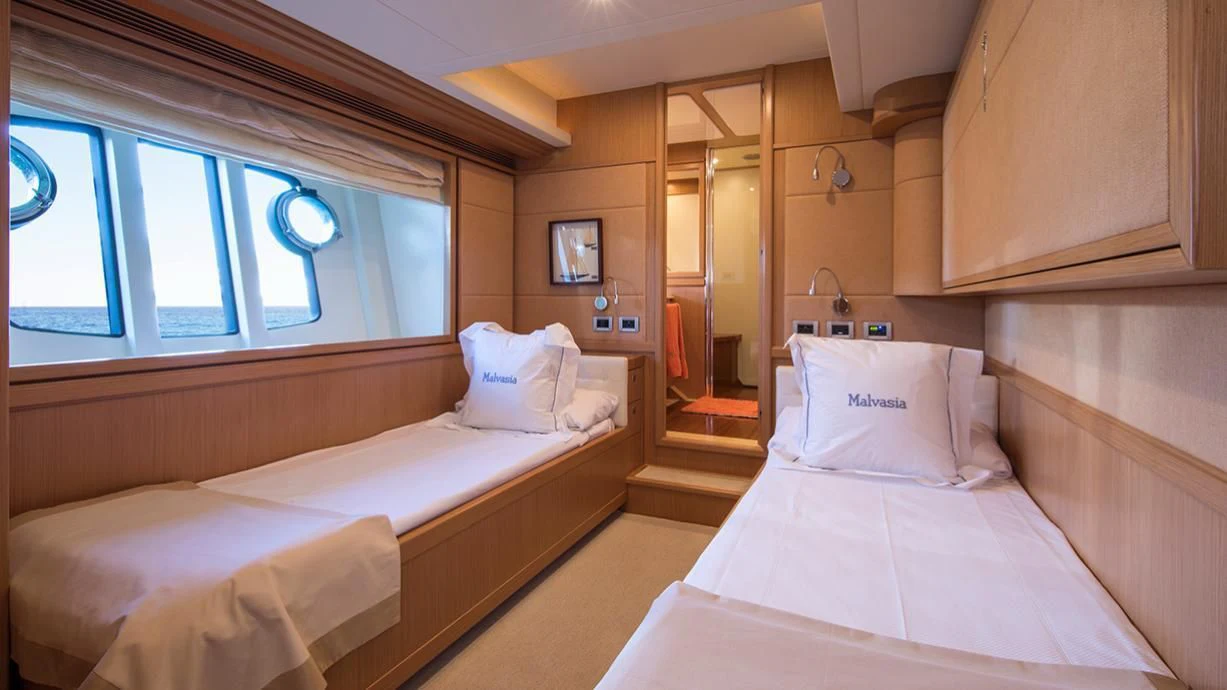 a room with two beds aboard EOLIA Yacht for Sale