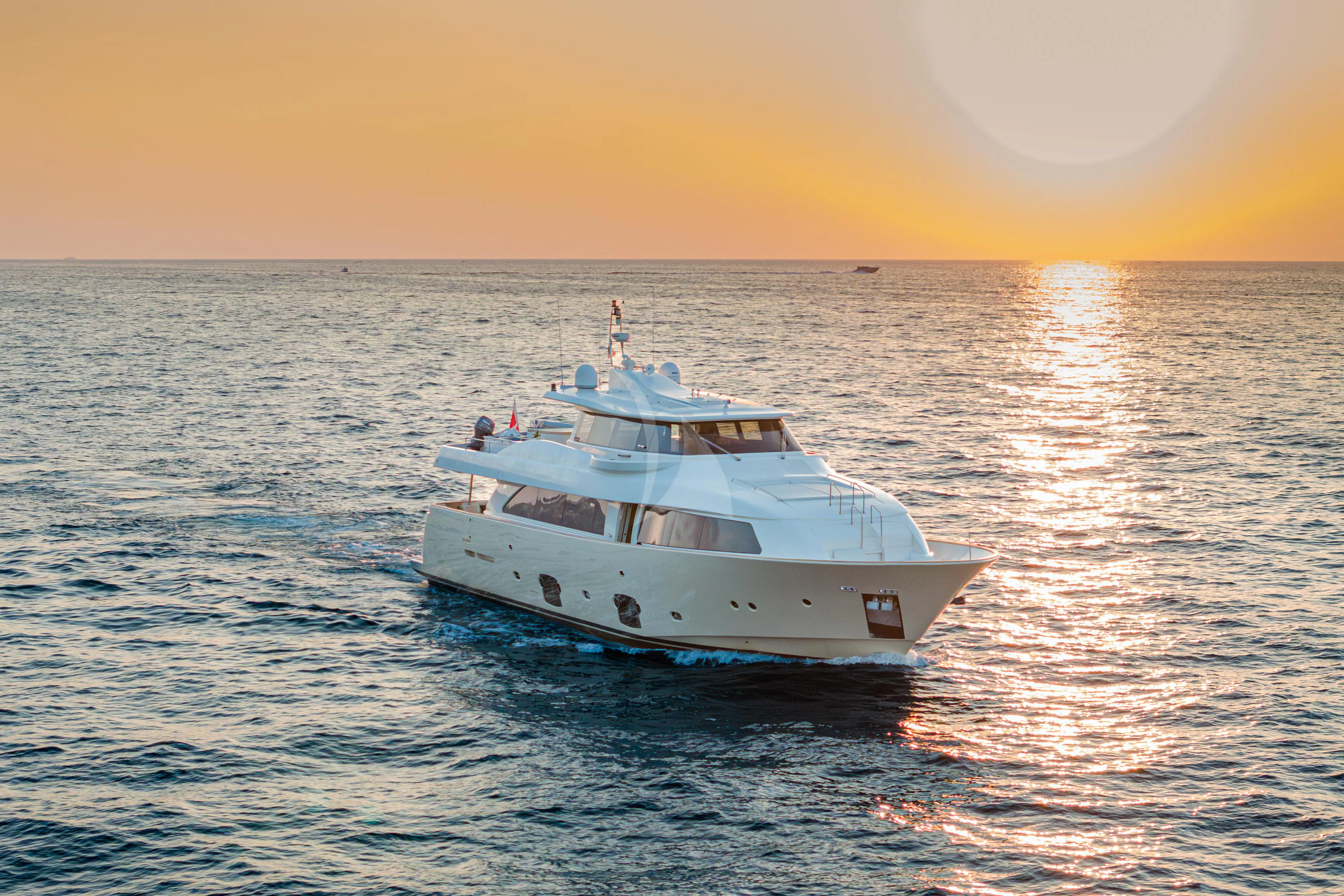 a white boat in the water aboard EOLIA Yacht for Sale