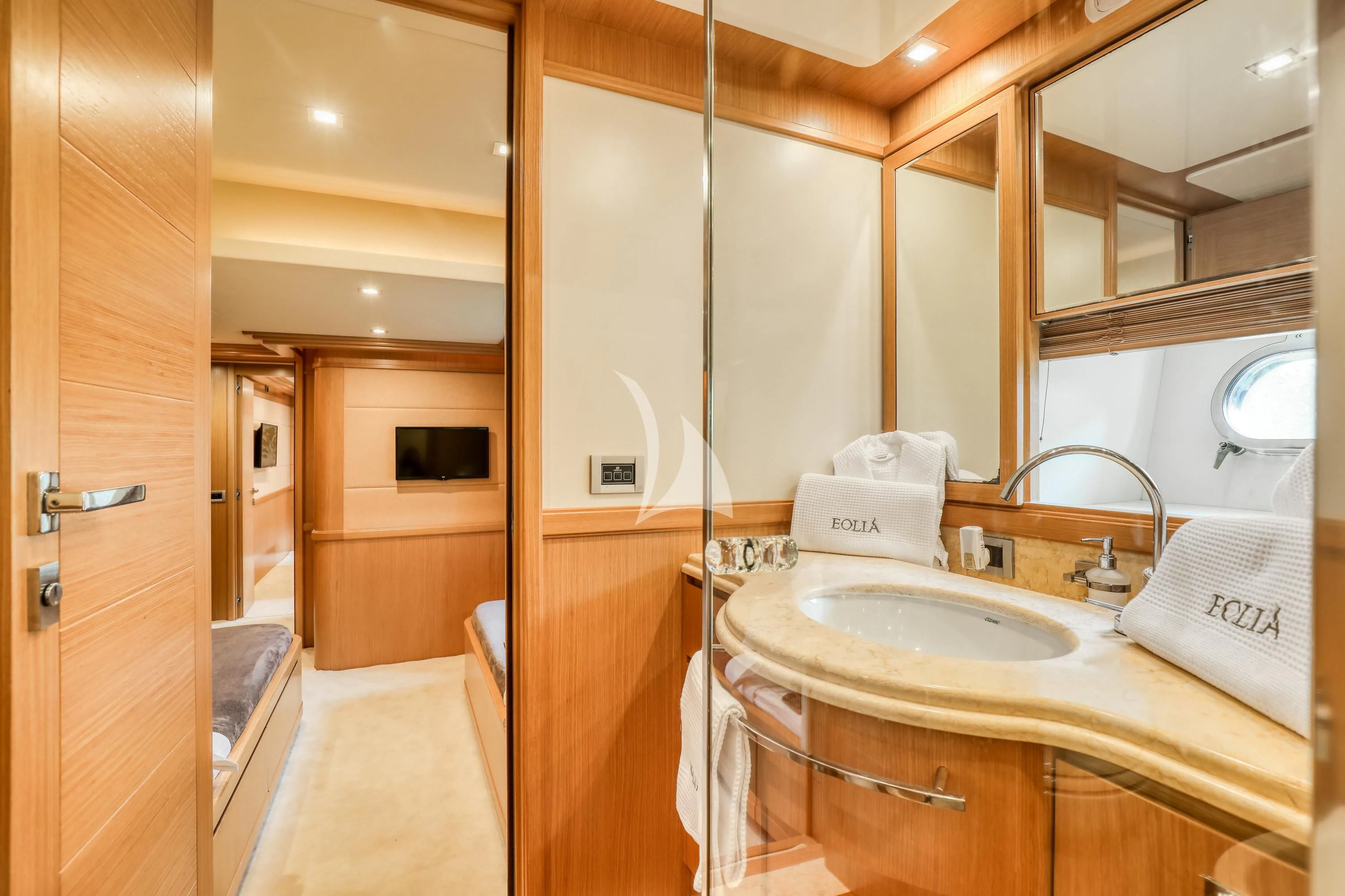 a bathroom with a sink and a mirror aboard EOLIA Yacht for Sale