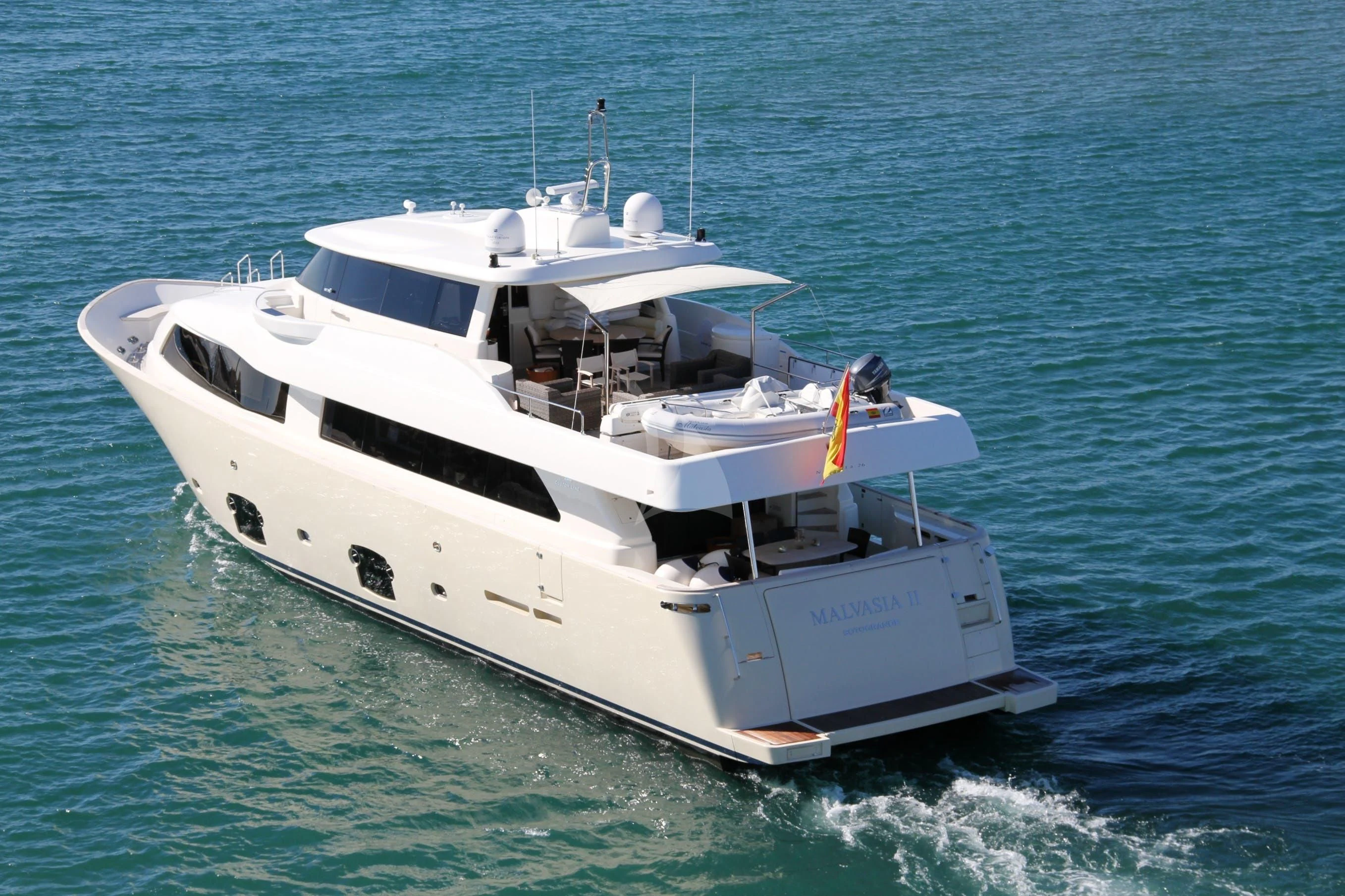 a white boat in the water aboard EOLIA Yacht for Sale