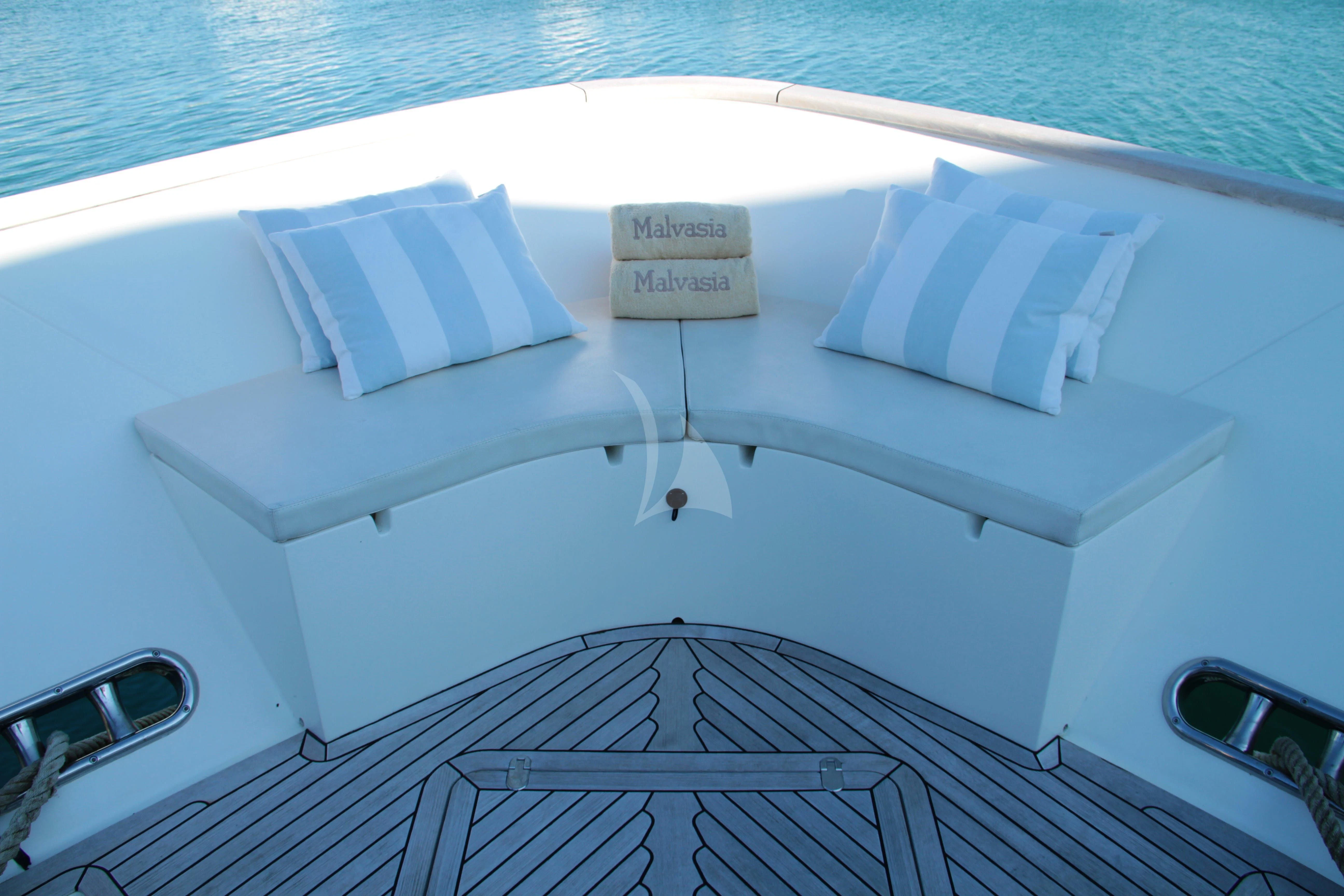 a white boat with a white cover aboard EOLIA Yacht for Sale