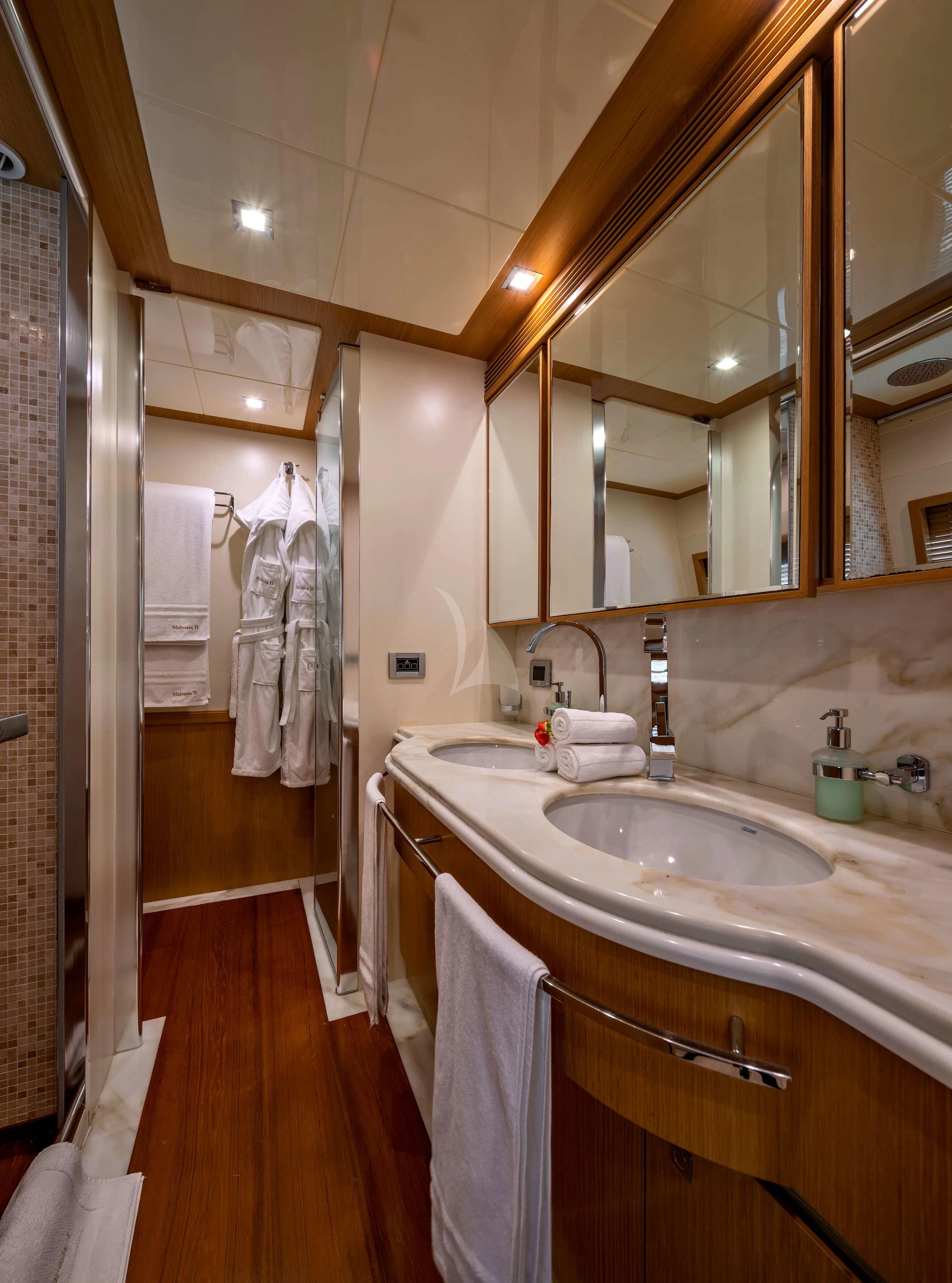 a bathroom with a large mirror aboard EOLIA Yacht for Sale