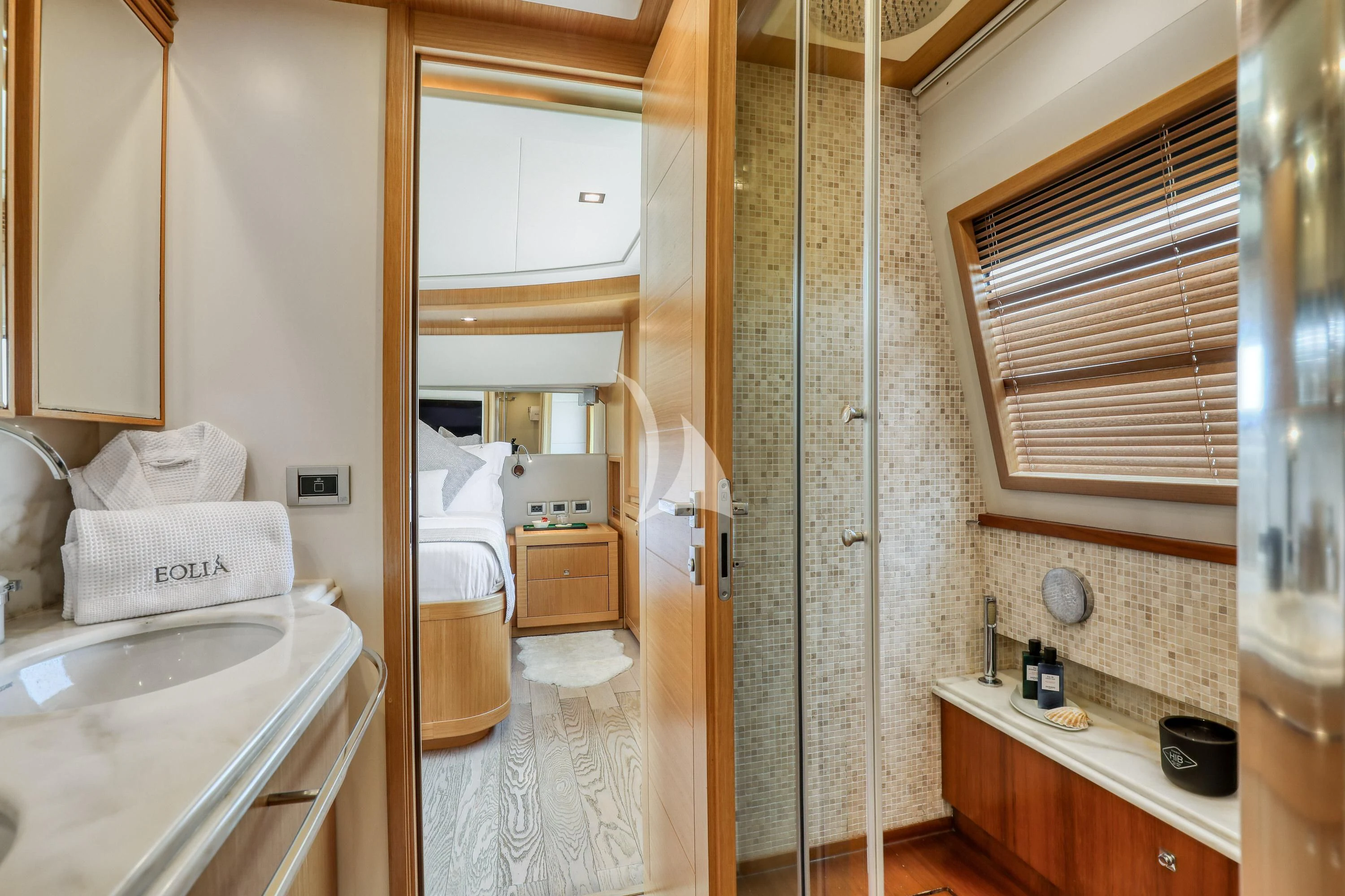 a bathroom with a sink and a shower unit aboard EOLIA Yacht for Sale
