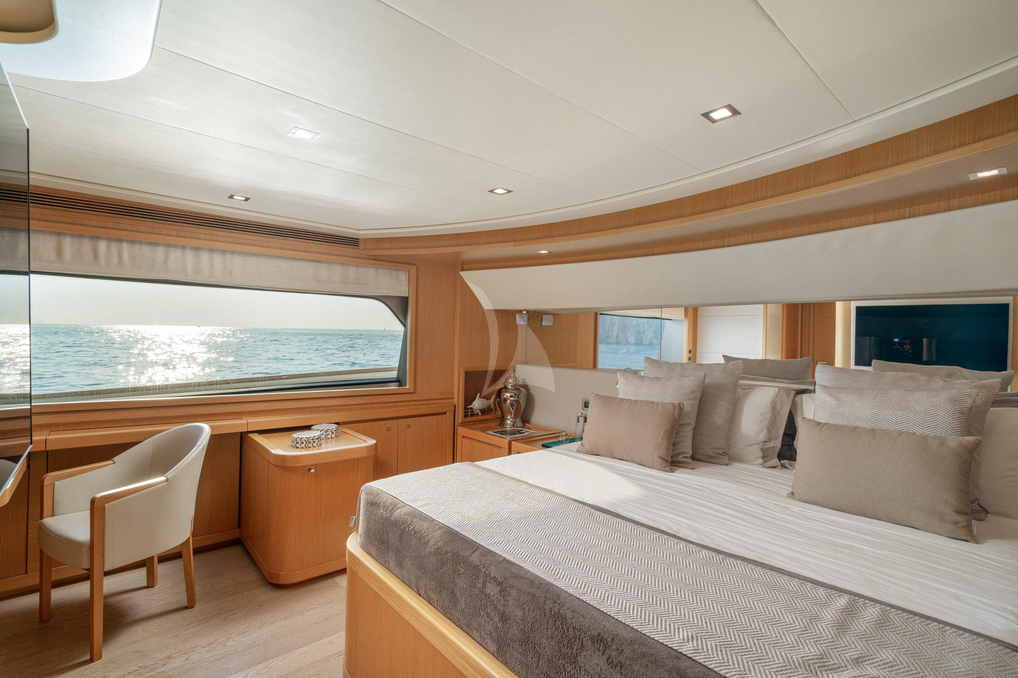 a large bed in a room aboard EOLIA Yacht for Sale