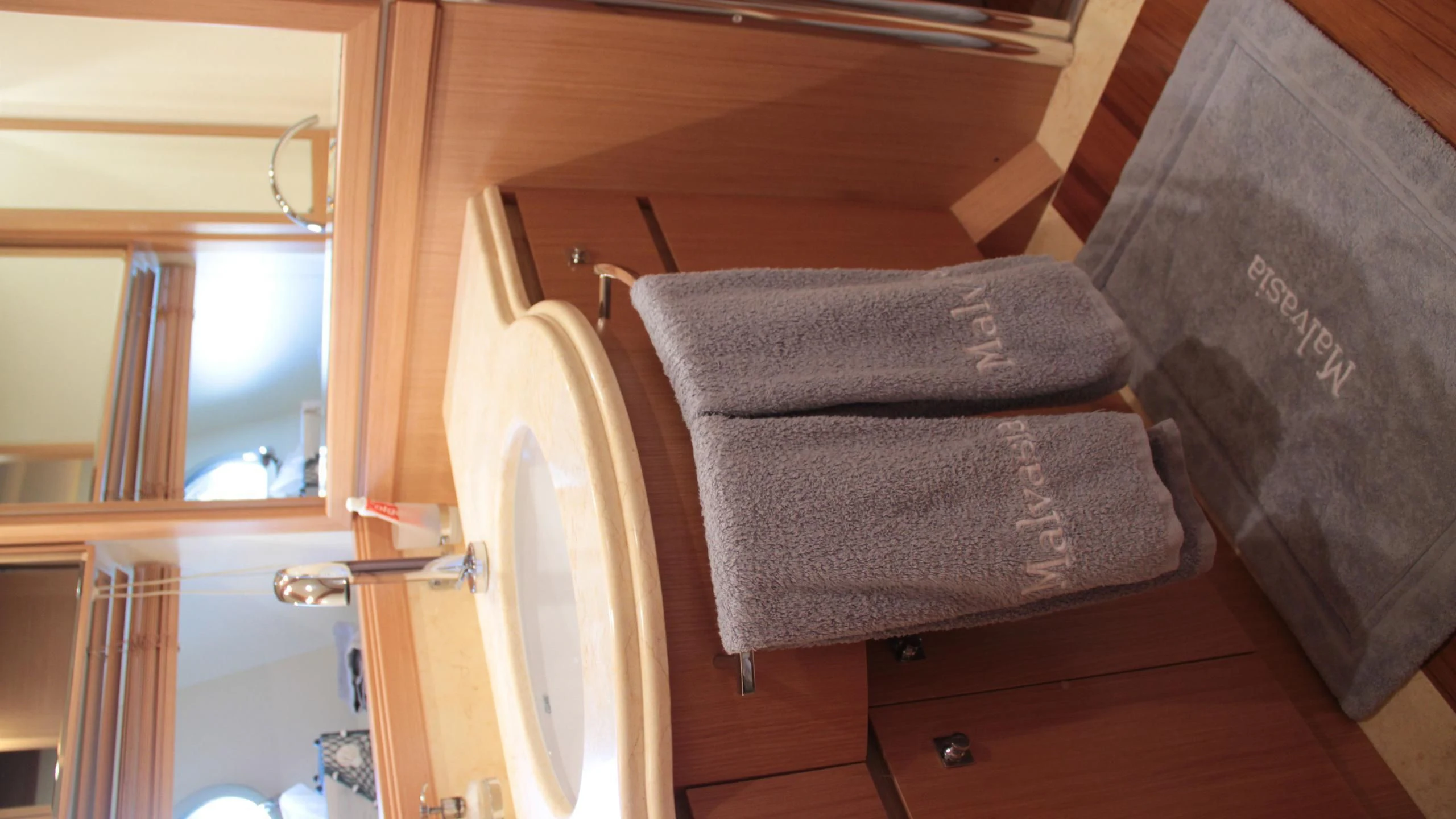 a towel on a chair aboard EOLIA Yacht for Sale