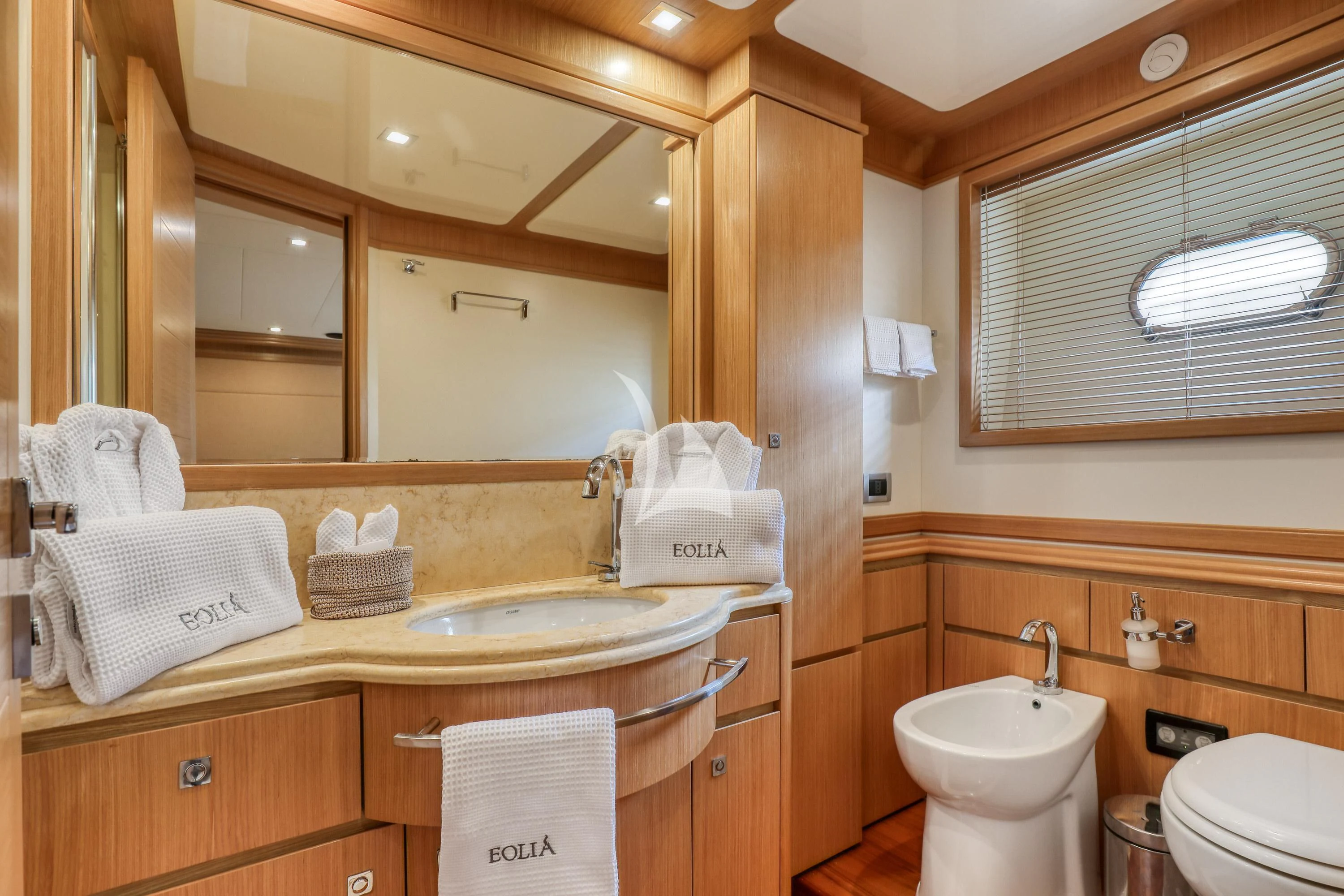 a bathroom with a sink and toilet aboard EOLIA Yacht for Sale