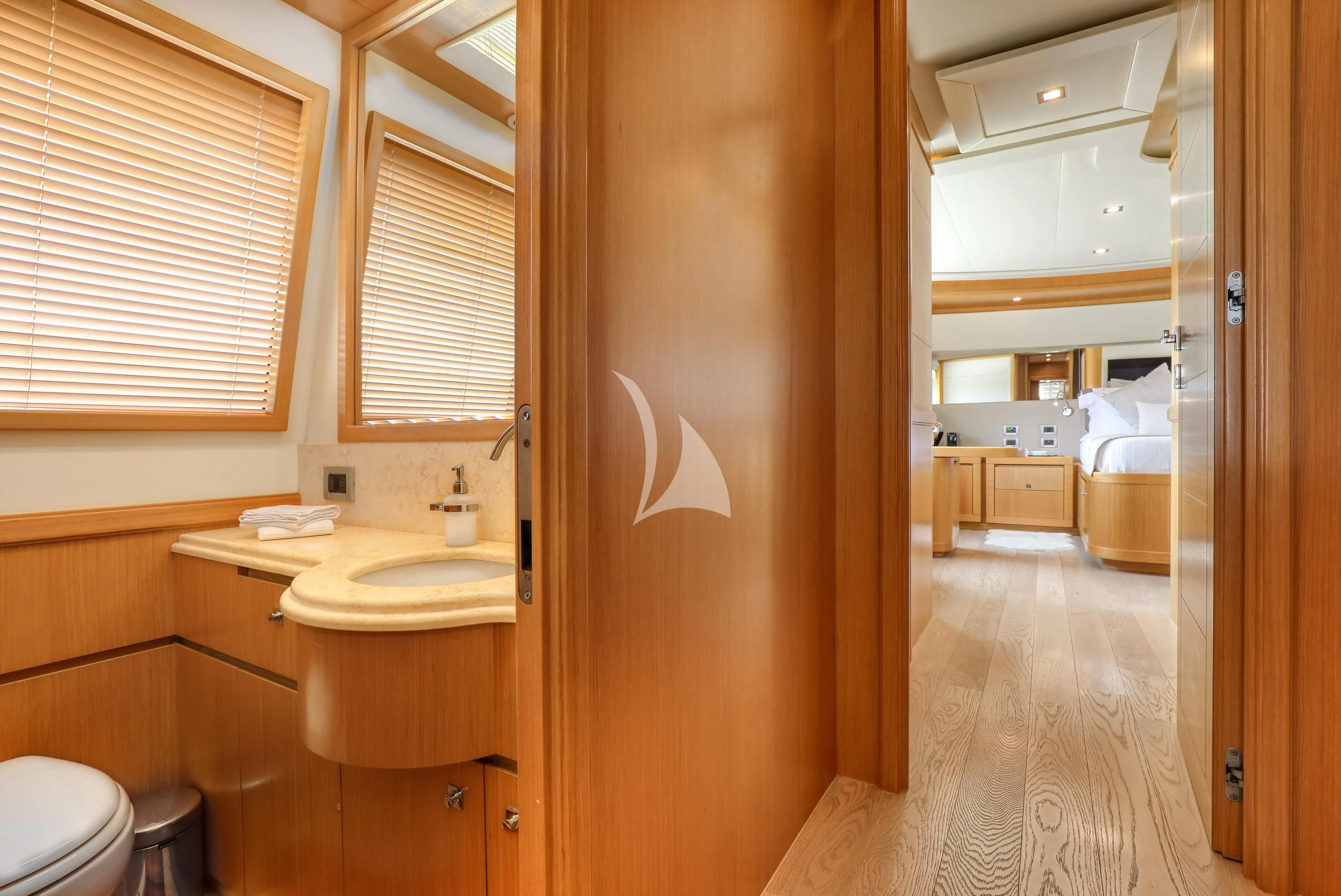 a bathroom with a sink and a toilet aboard EOLIA Yacht for Sale