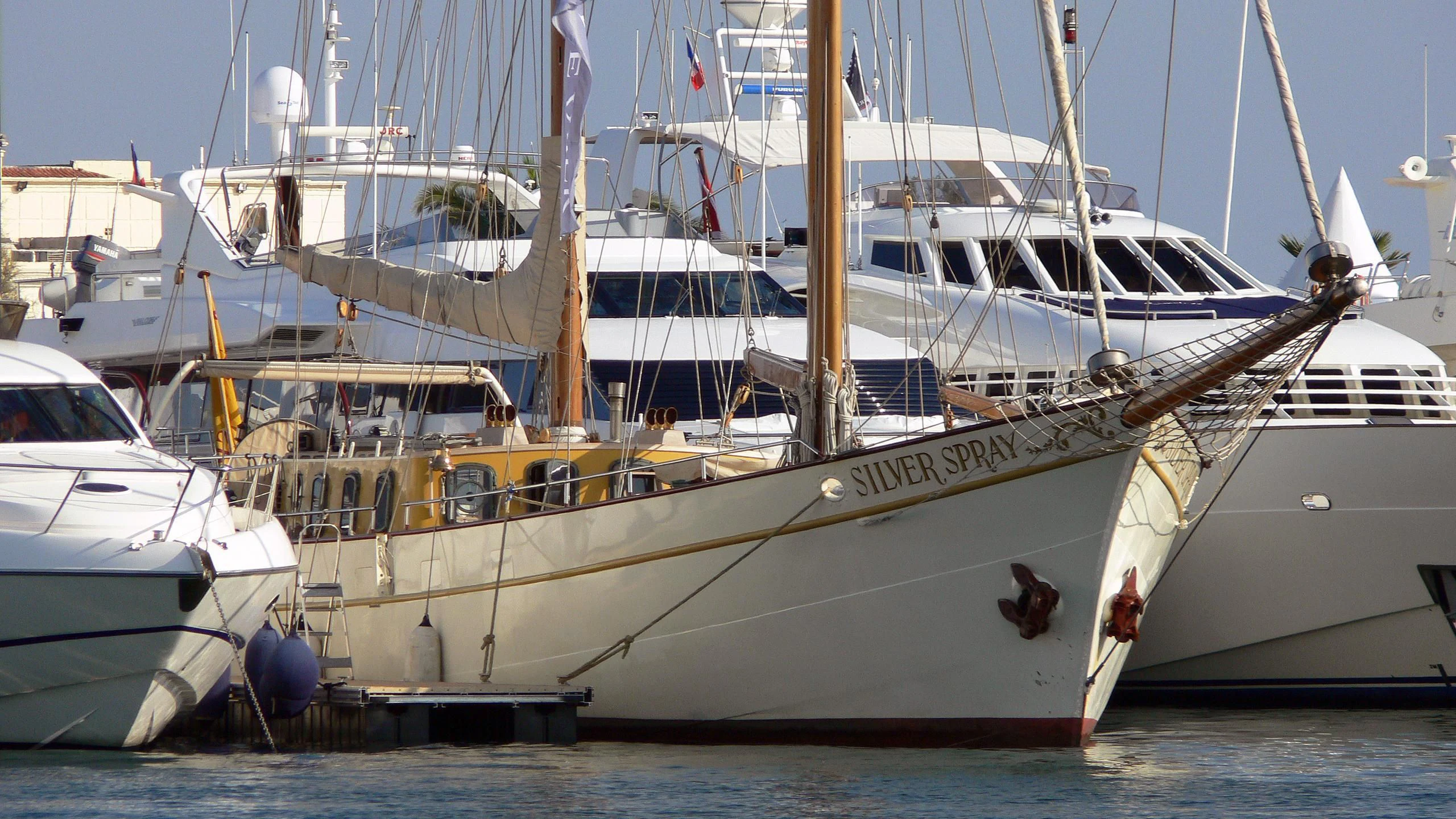 several boats in a harbor aboard SILVER SPRAY Yacht for Sale