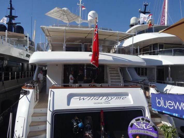 a boat with a sign on the front aboard AURA Yacht for Sale