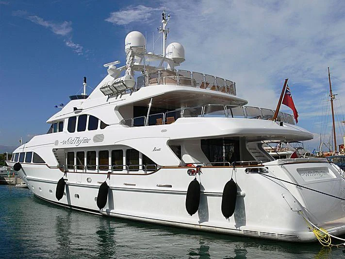 a large white boat aboard AURA Yacht for Sale