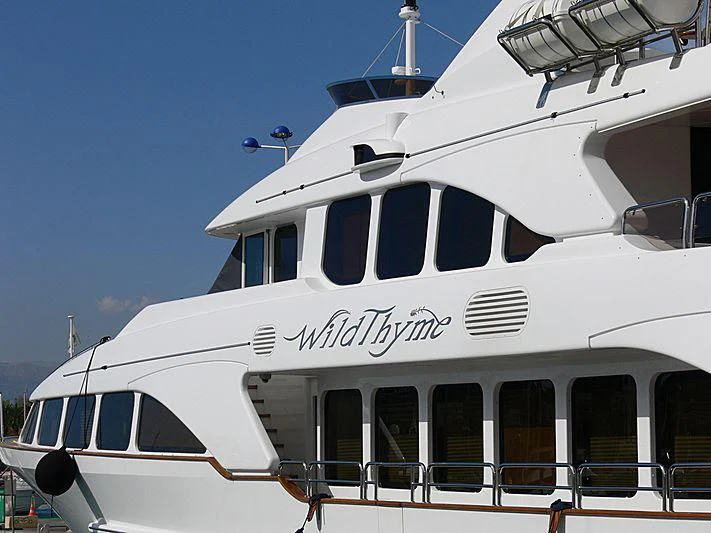 a white yacht with windows aboard AURA Yacht for Sale