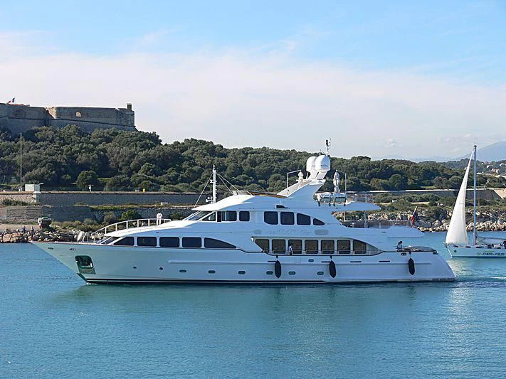 a couple of boats on the water aboard AURA Yacht for Sale