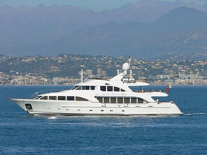 a white yacht in the water aboard AURA Yacht for Sale