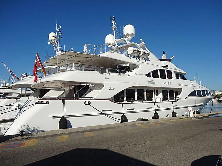 a large white boat aboard AURA Yacht for Sale