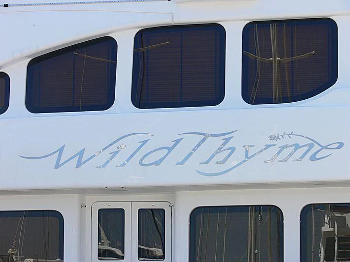 a white train with blue lettering aboard AURA Yacht for Sale