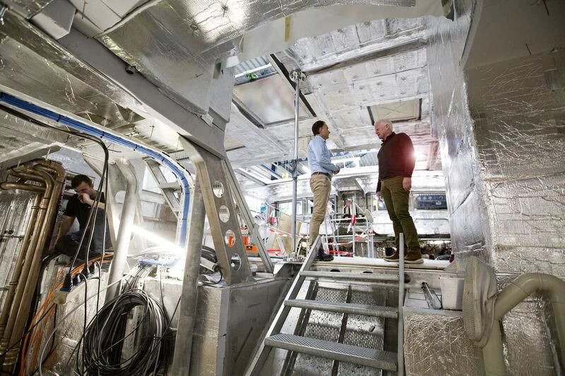 a few people on a ladder aboard AQUARIUS Yacht for Sale