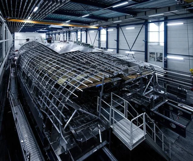 a large factory with many racks of equipment aboard AQUARIUS Yacht for Sale