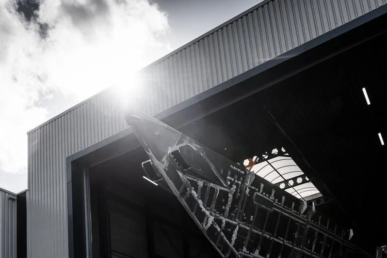 a building with a plane on top aboard AQUARIUS Yacht for Sale
