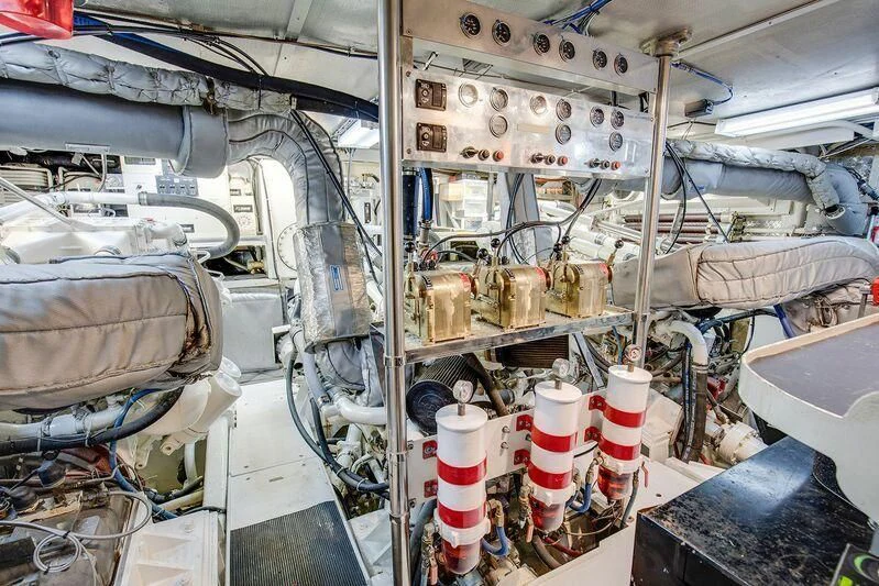 a room with a large machine aboard LE CANARD Yacht for Sale