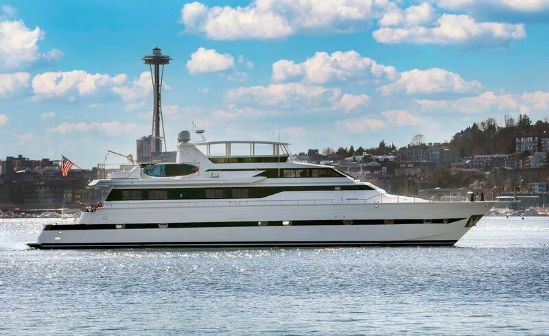 a white yacht on the water aboard LE CANARD Yacht for Sale