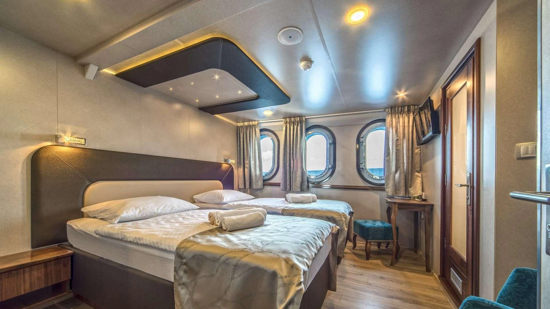 a room with two beds aboard CASABLANCA Yacht for Sale