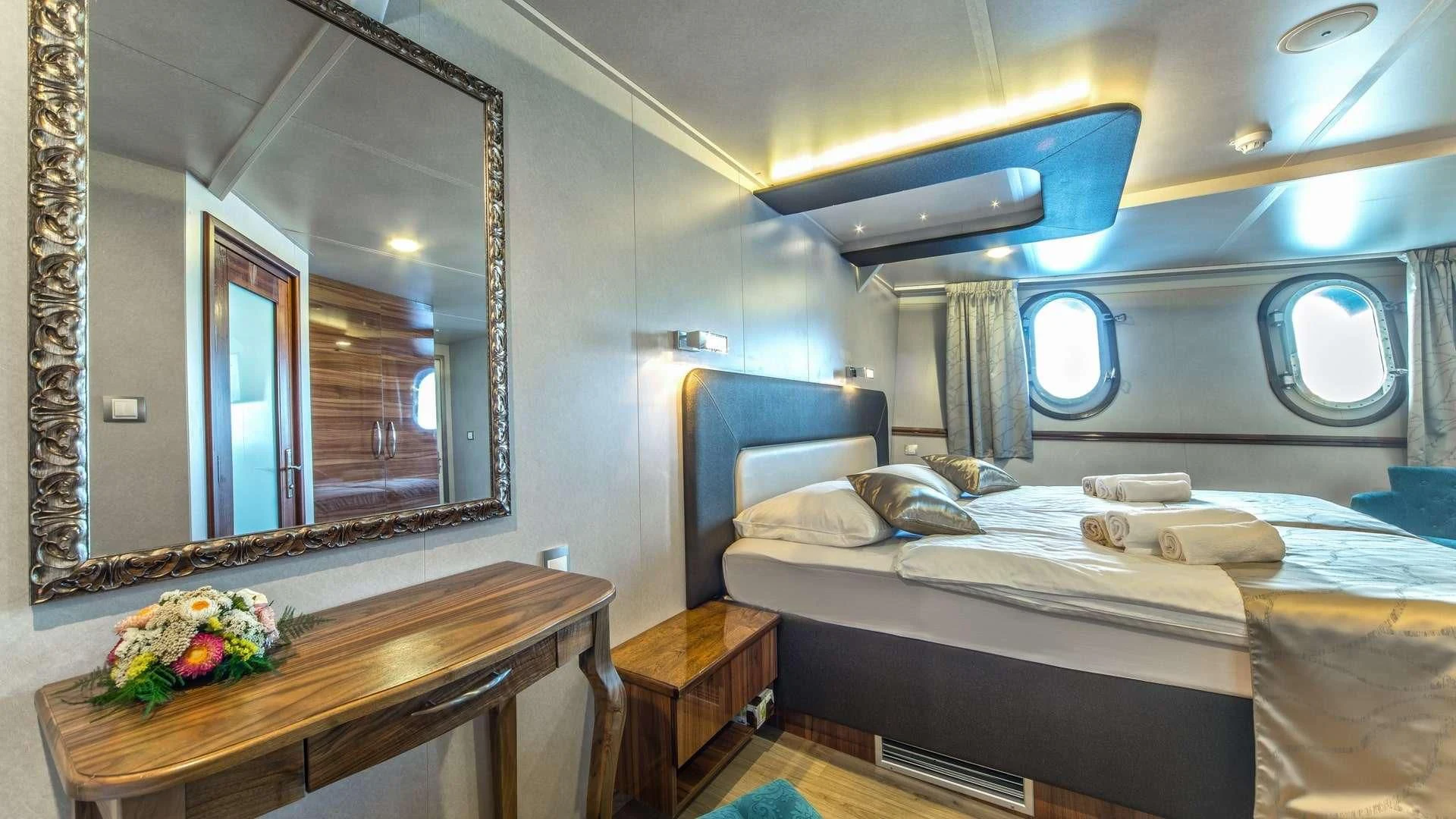 a room with two beds aboard CASABLANCA Yacht for Sale