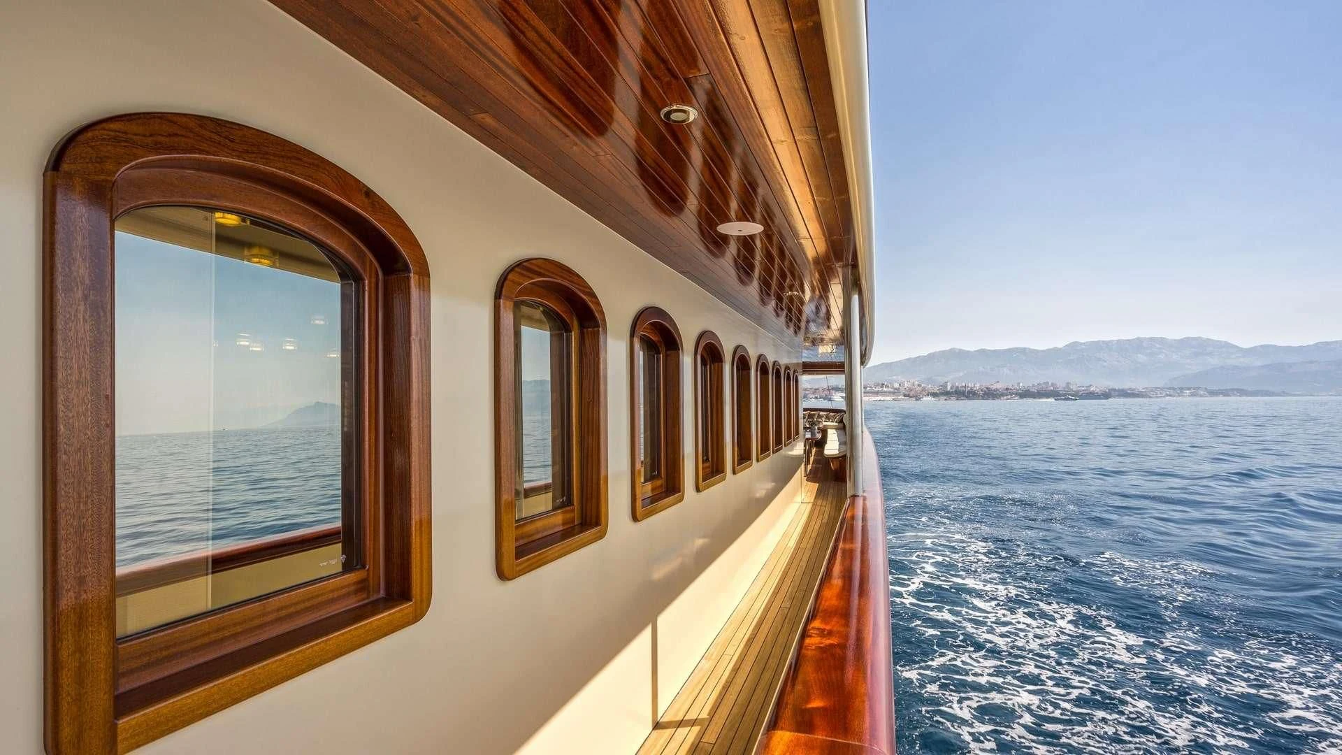 a view of a snowy landscape from a balcony aboard CASABLANCA Yacht for Sale
