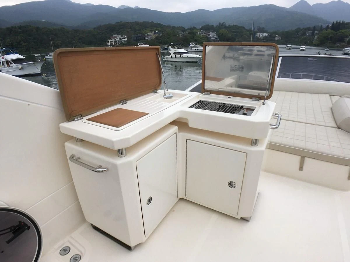 a white machine on a boat aboard AZIMUT 75 Yacht for Sale