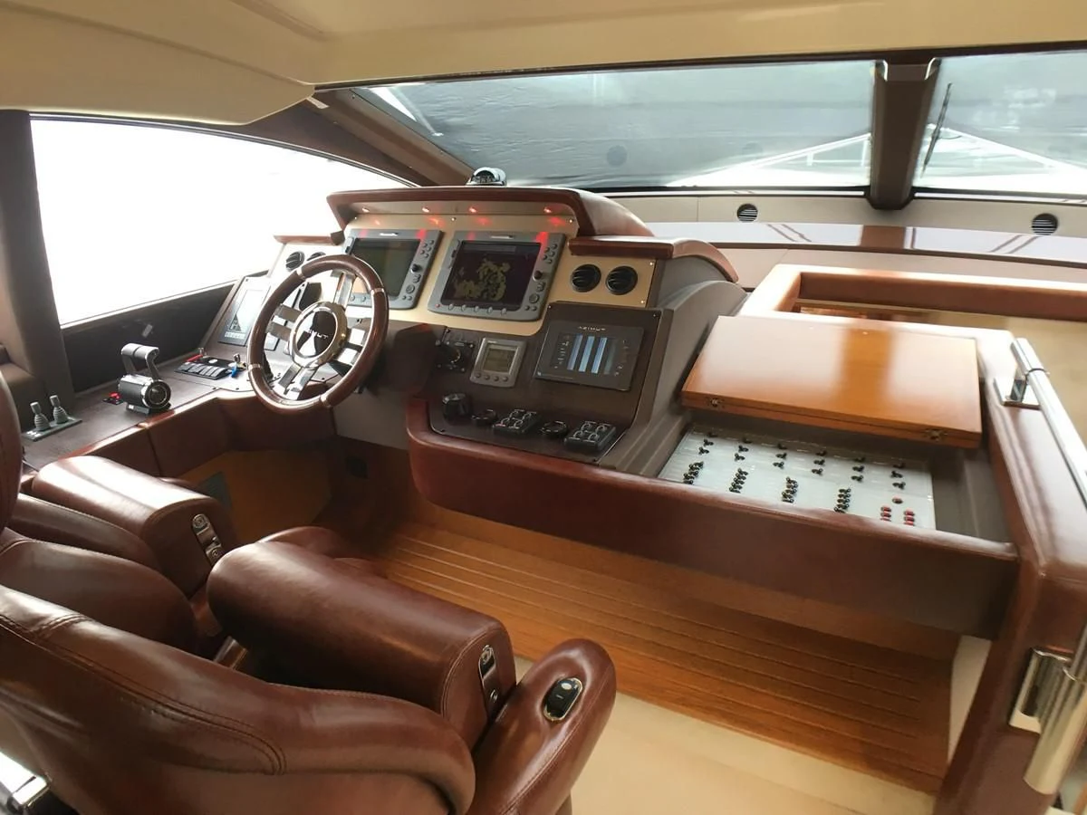 a wooden desk with a radio on it aboard AZIMUT 75 Yacht for Sale