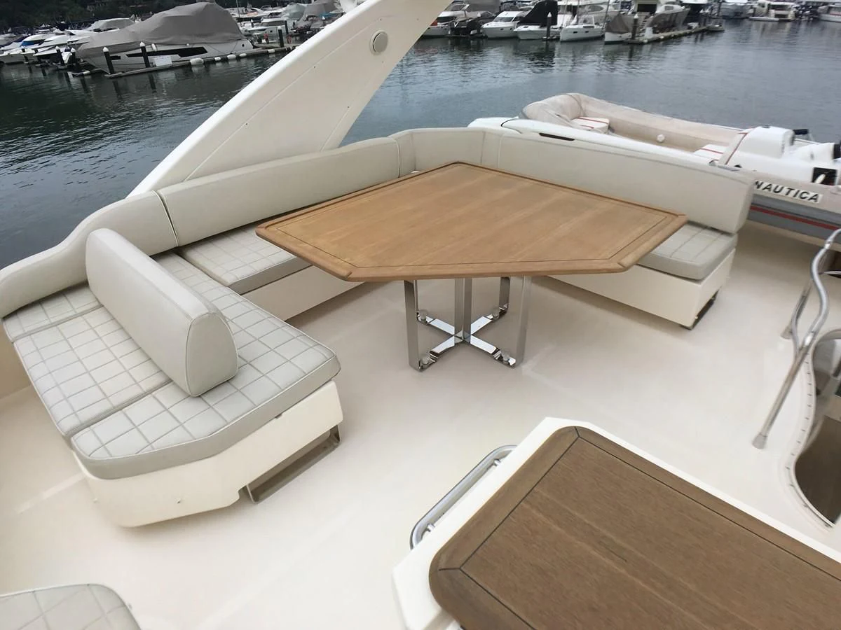 a group of white boats on a dock aboard AZIMUT 75 Yacht for Sale