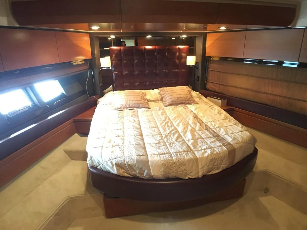 a bed in a room aboard AZIMUT 75 Yacht for Sale