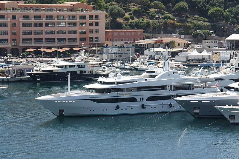 a group of boats are parked in the water aboard LADY MARINA Yacht for Sale