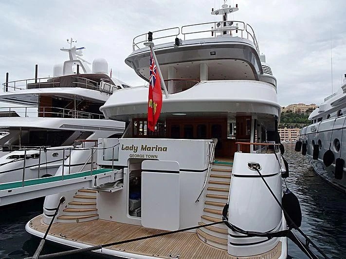 a boat docked at a pier aboard LADY MARINA Yacht for Sale