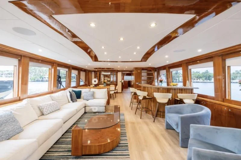 a large living room with a wood ceiling aboard OCEANS I Yacht for Sale