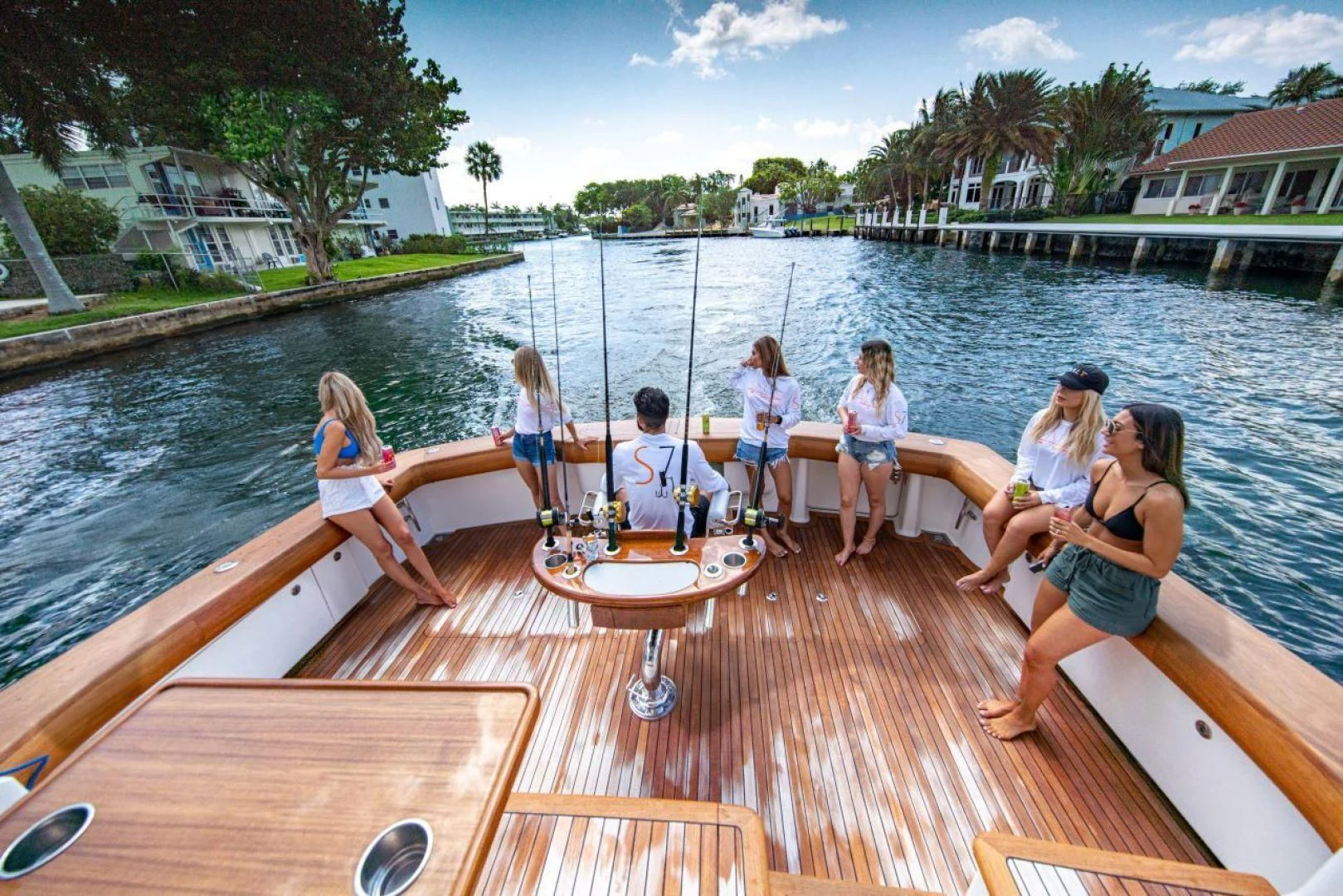 a group of people on a dock aboard SALT7 Yacht for Sale