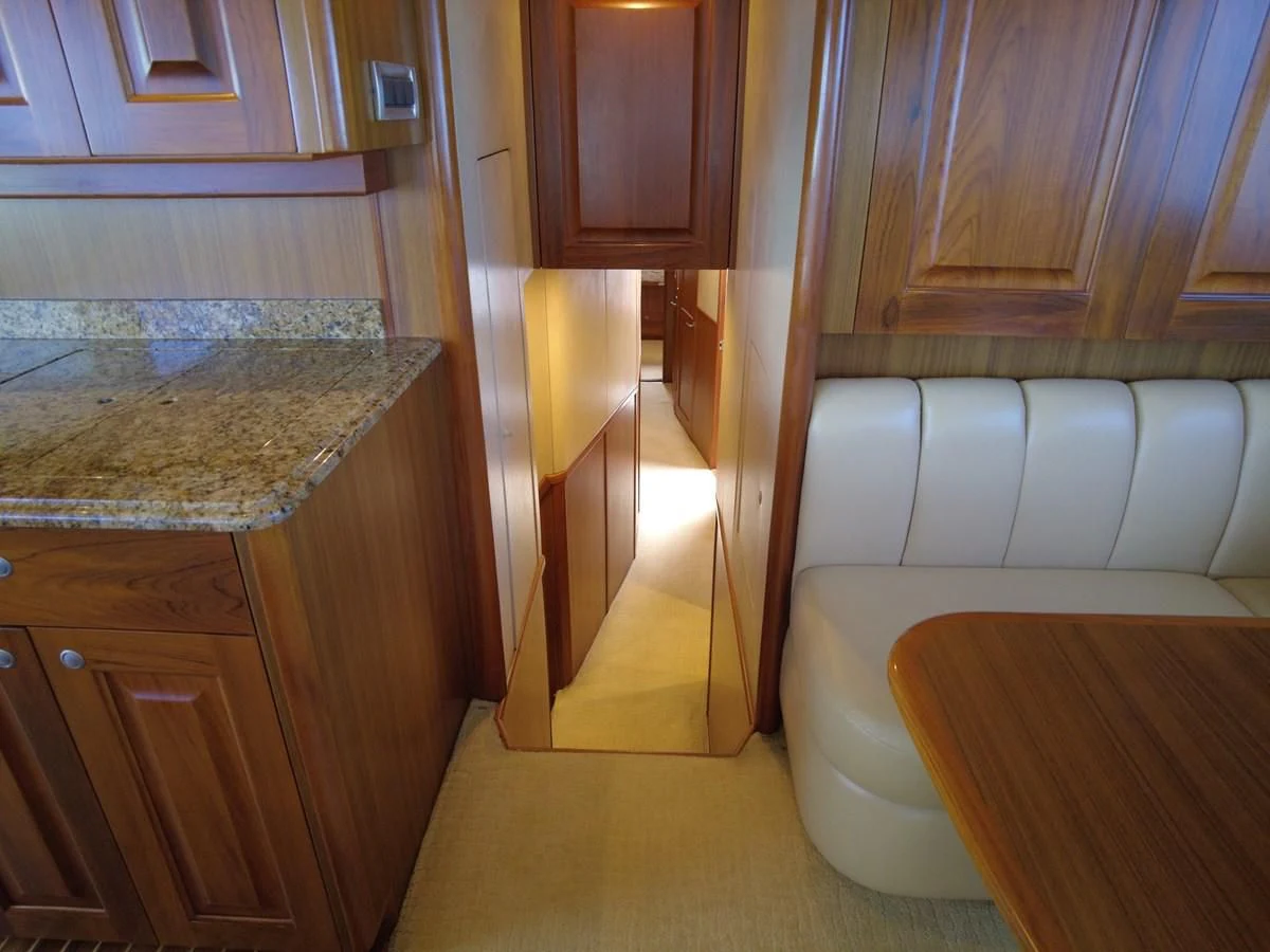 a room with a counter and cabinets aboard SALT7 Yacht for Sale