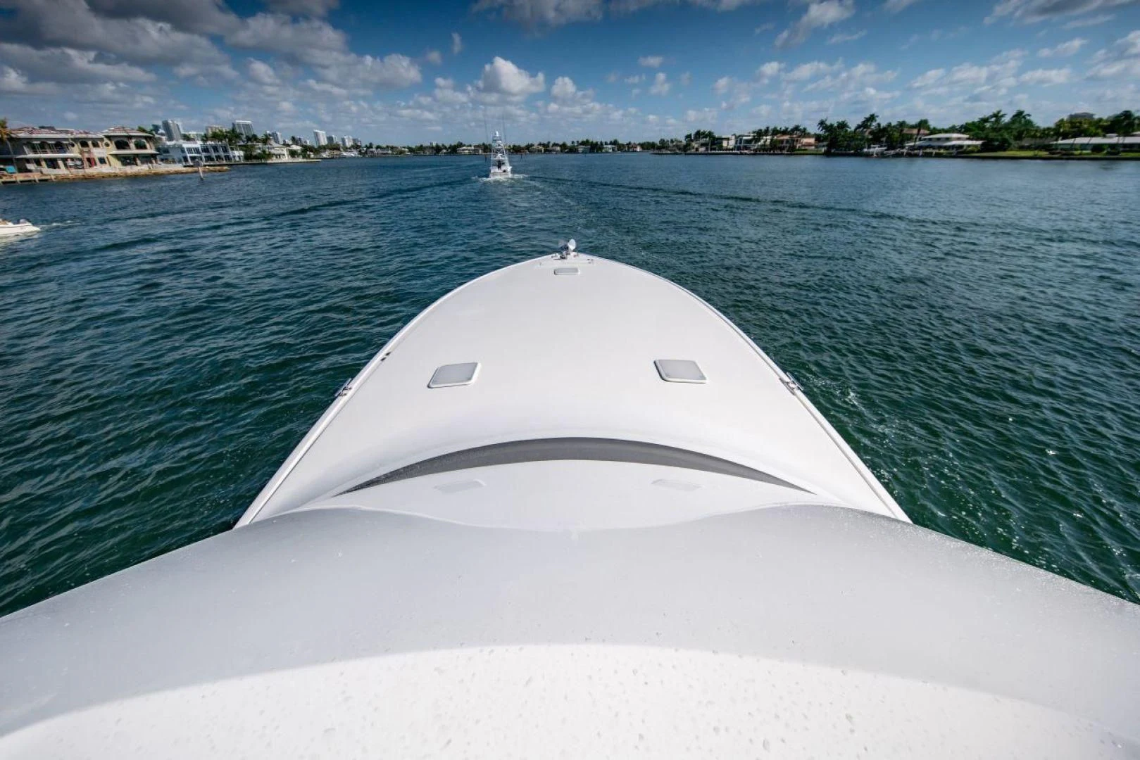 a white boat in the water aboard SALT7 Yacht for Sale