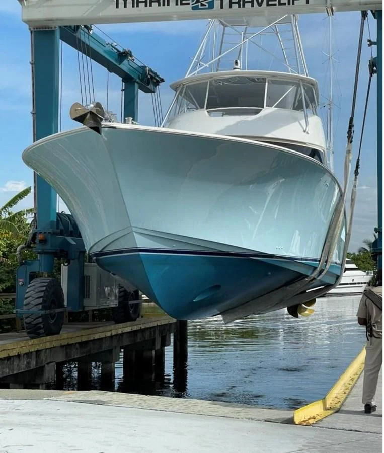 a boat docked at a pier aboard SALT7 Yacht for Sale