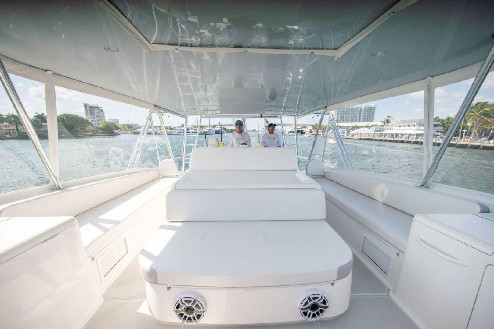 a group of people sitting on a white object on a white surface aboard SALT7 Yacht for Sale