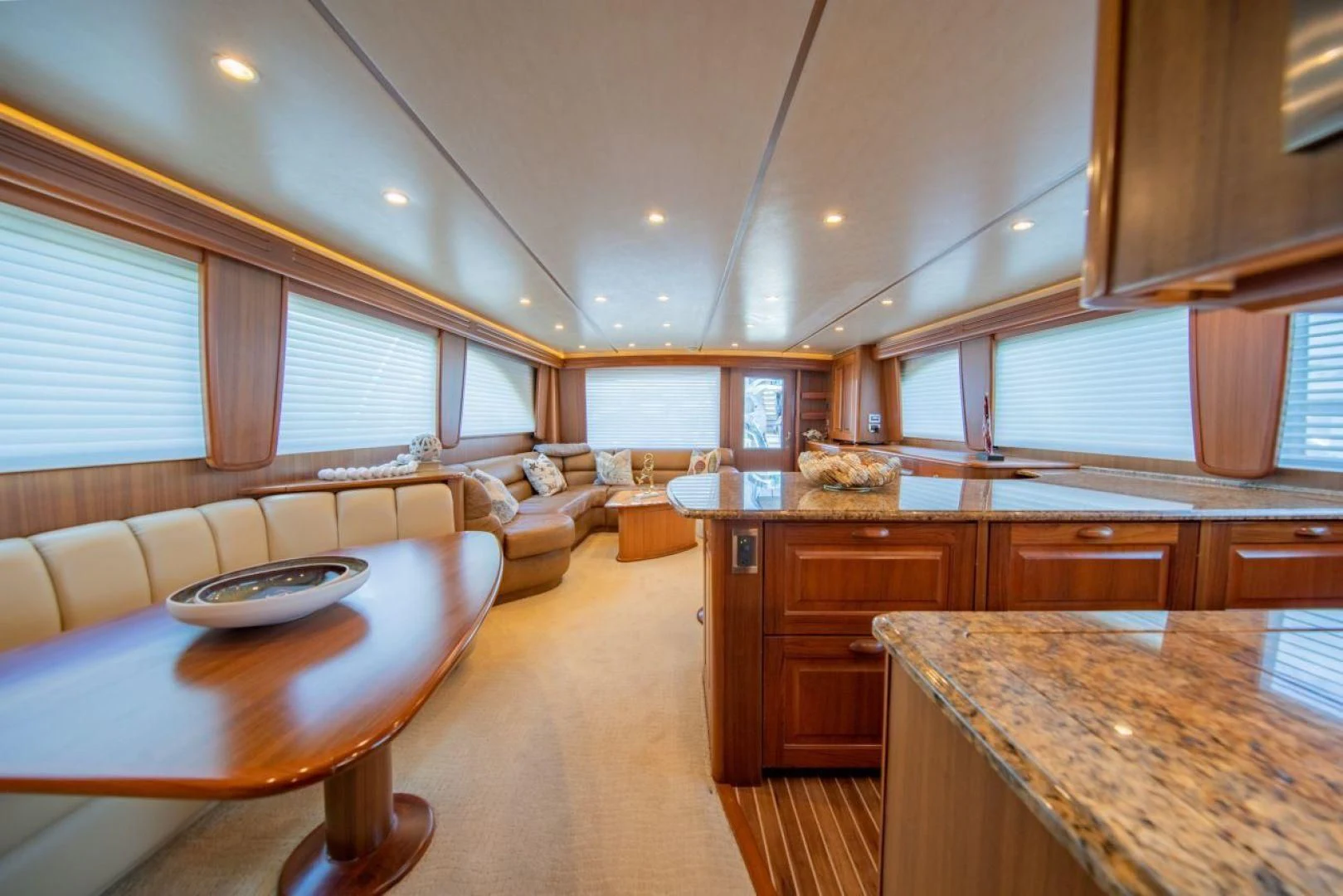 a large kitchen and living room aboard SALT7 Yacht for Sale
